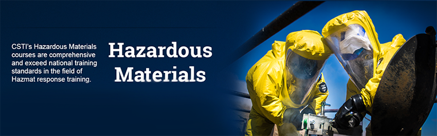 CSTI Hazardous Materials Courses Image - Two students fix leak on rail car while in yellow decon suits